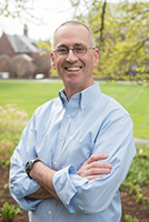 headshot of Gregory White