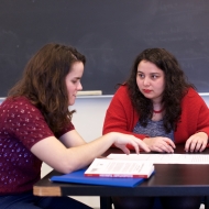Language Center conversation partner talking to student