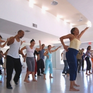 Teacher leads an Afro Cuban class