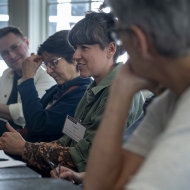 a group of people having a discussion