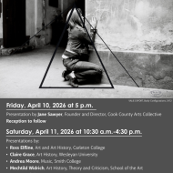 an artist squatting appears to hug a wall.