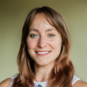 Portrait of Bethany Dickerson with a warm background