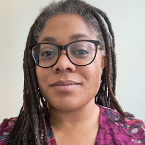 Portrait of DeLea Mowatt with a cream background